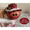 This is a fall gourd decoration is named Apple and has a lacy handmade hat. She comes with a battery-operated candle to light up her smile.